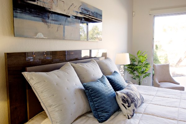 Contemporary decorative blue and white pillows from a Scottsdale remodel