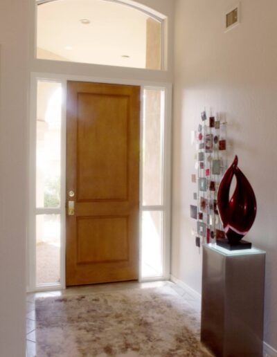 Entryway - mid-sized modern porcelain tile and beige floor entryway